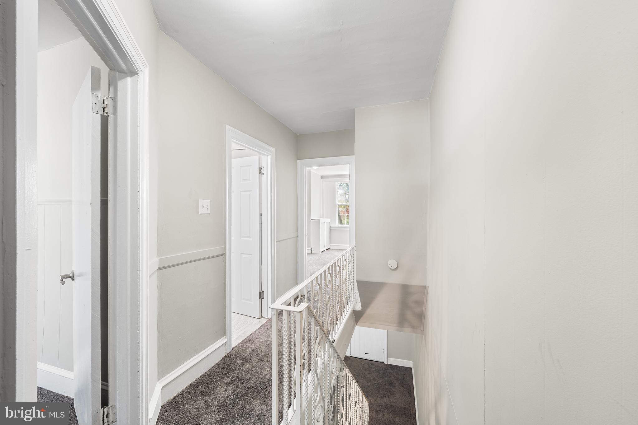 309 Sanford Road Upper Darby, PA 19082 - Photo 15 of 21 a view of a hallway with wooden floor and entryway