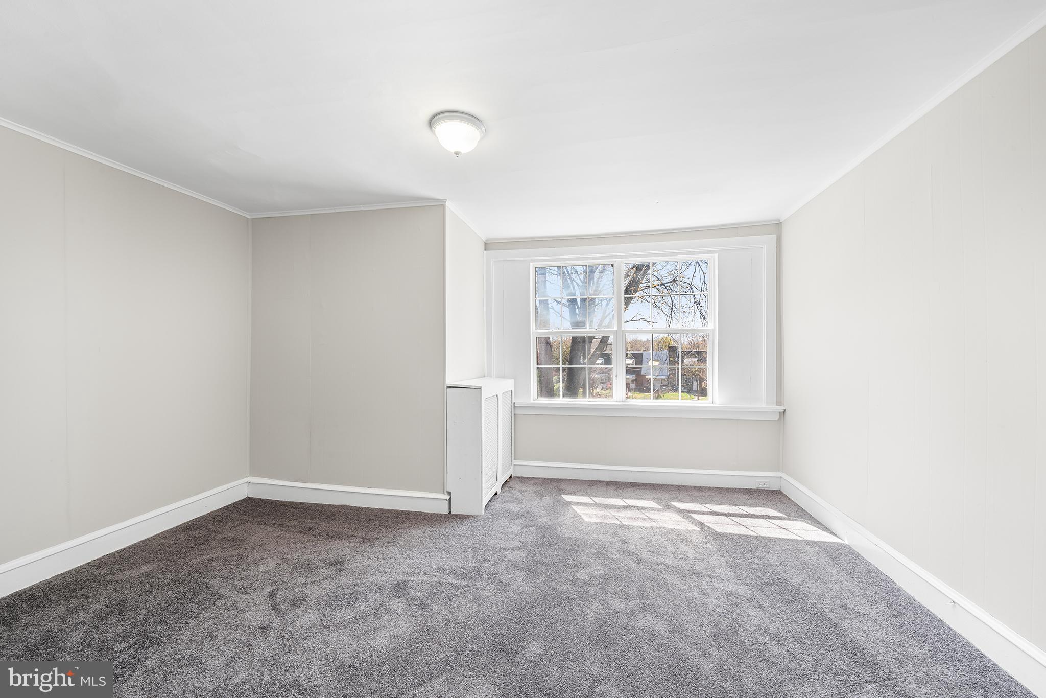 309 Sanford Road Upper Darby, PA 19082 - Photo 17 of 21 an empty room with a window