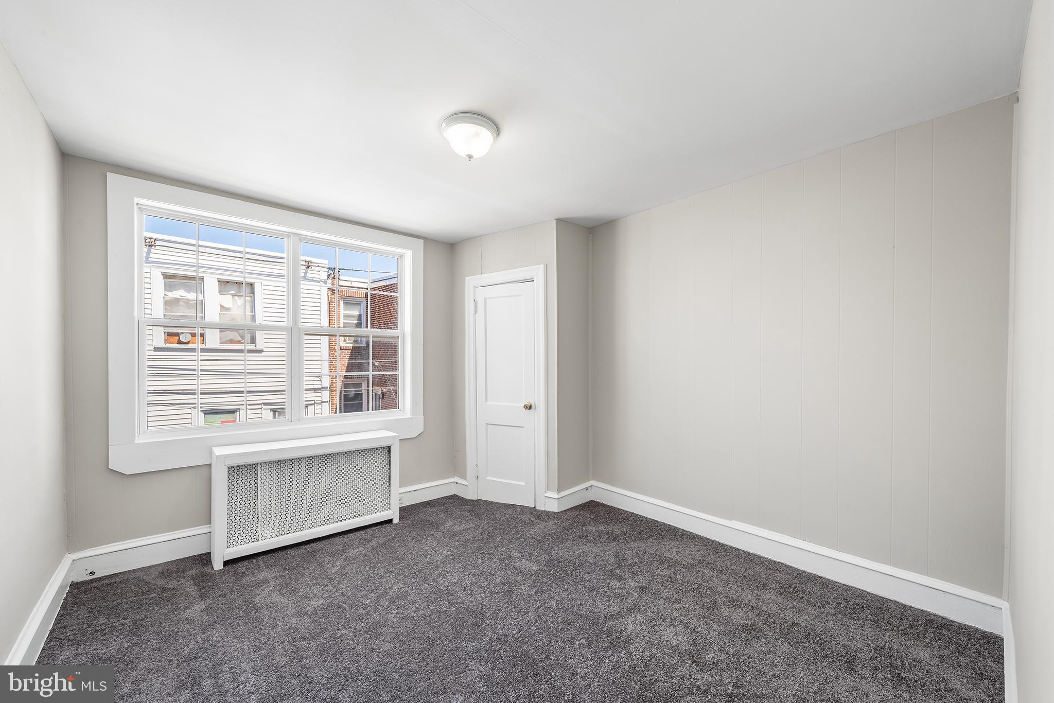 309 Sanford Road Upper Darby, PA 19082 - Photo 19 of 21 a view of an empty room with a window