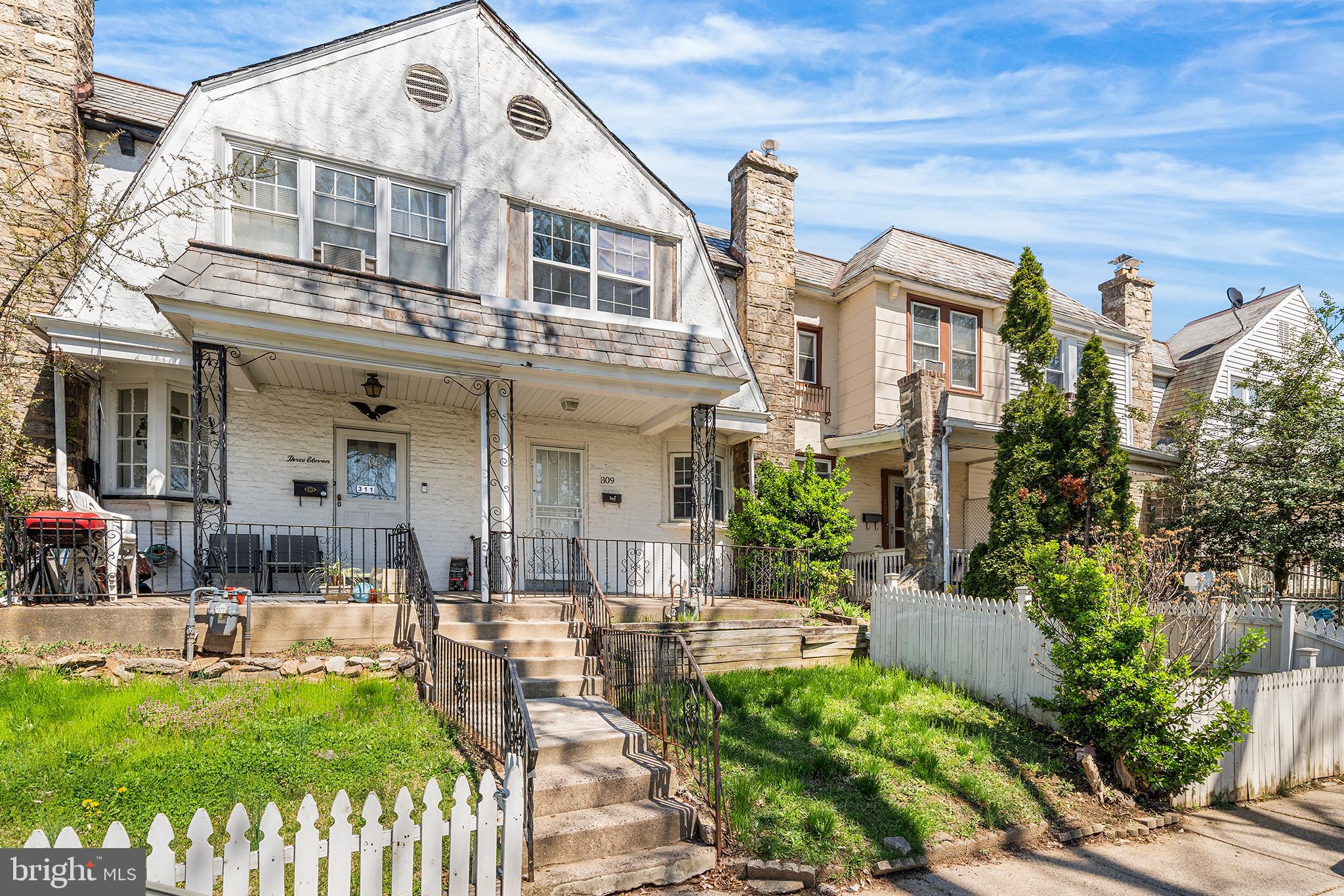 309 Sanford Road Upper Darby, PA 19082 - Photo 2 of 21 a front view of a house with a garden