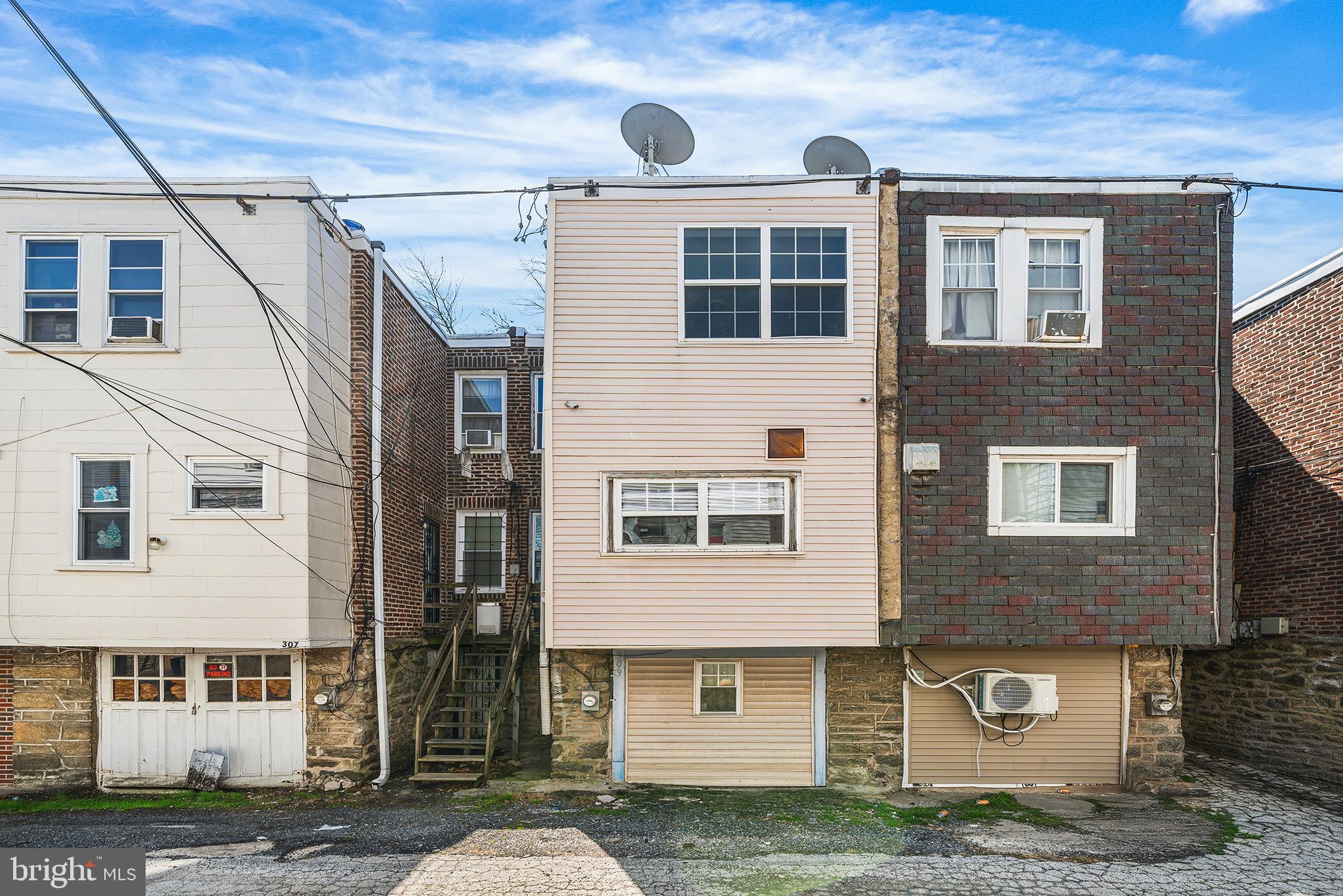 309 Sanford Road Upper Darby, PA 19082 - Photo 21 of 21 a front view of a house with garden