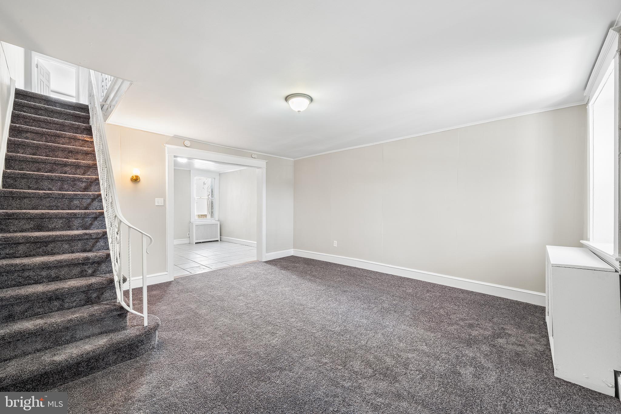 309 Sanford Road Upper Darby, PA 19082 - Photo 5 of 21 a view of an empty room with a window