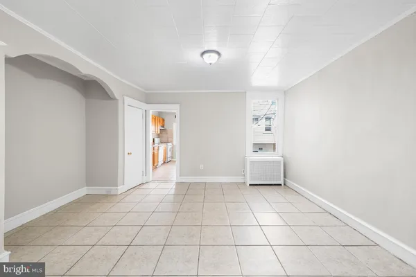 a view of an empty room and window