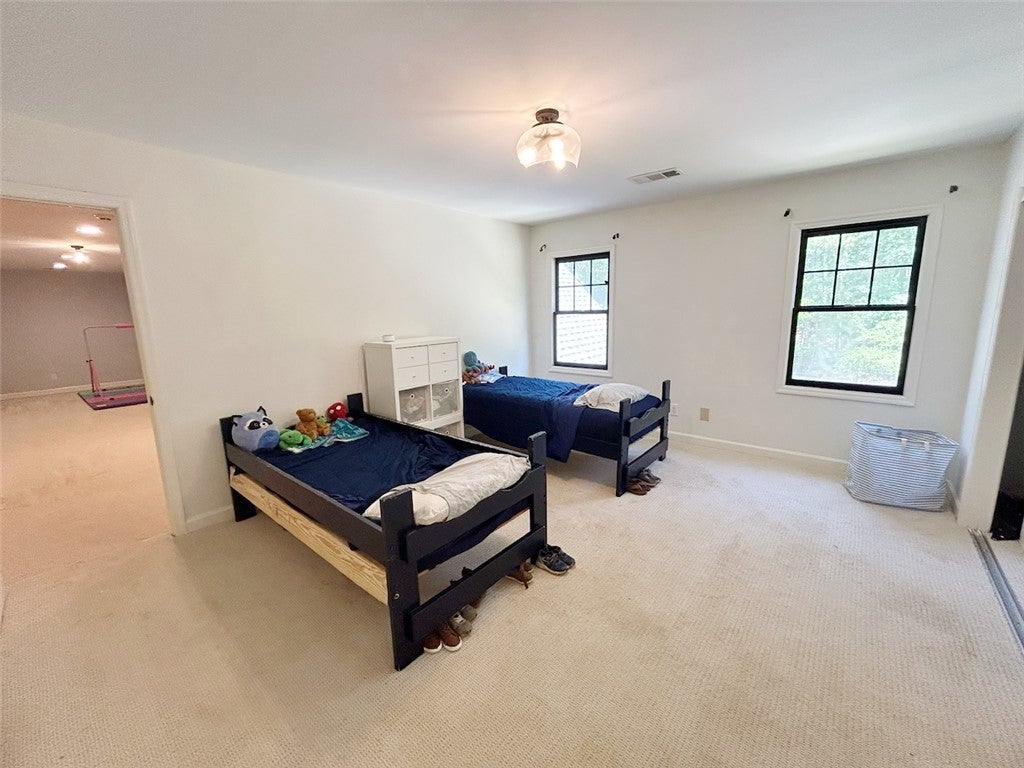 2004 Moores Mill Road Lanett, AL 36863 - Photo 46 of 50 This bright and airy bedroom features ample natural light.
