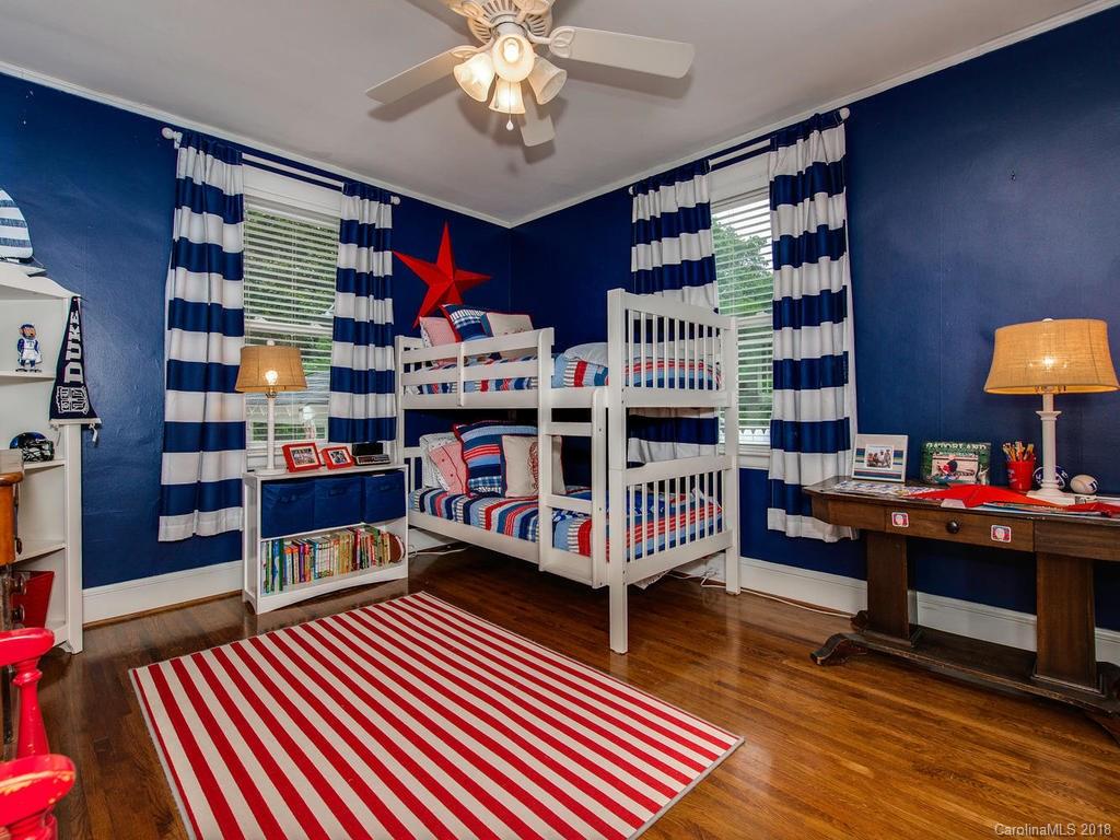 2174 Colony Road Charlotte, NC 28209 - Photo 15 of 24 a bedroom with furniture and a rug