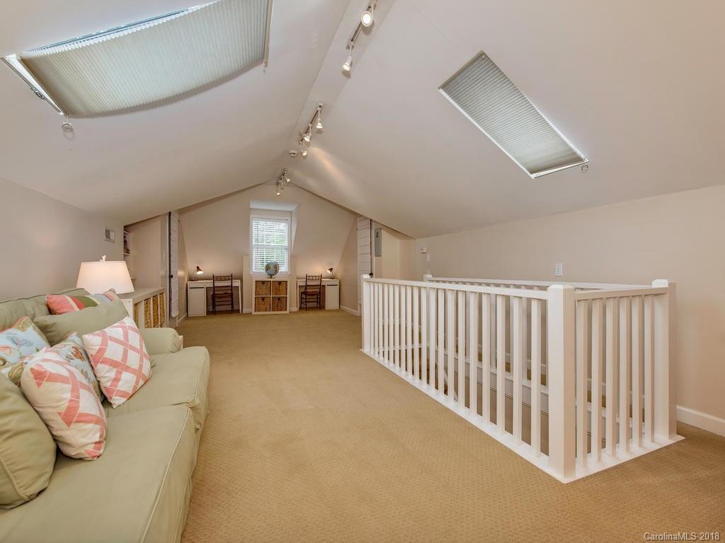 2174 Colony Road Charlotte, NC 28209 - Photo 18 of 24 a living room with furniture and kitchen view