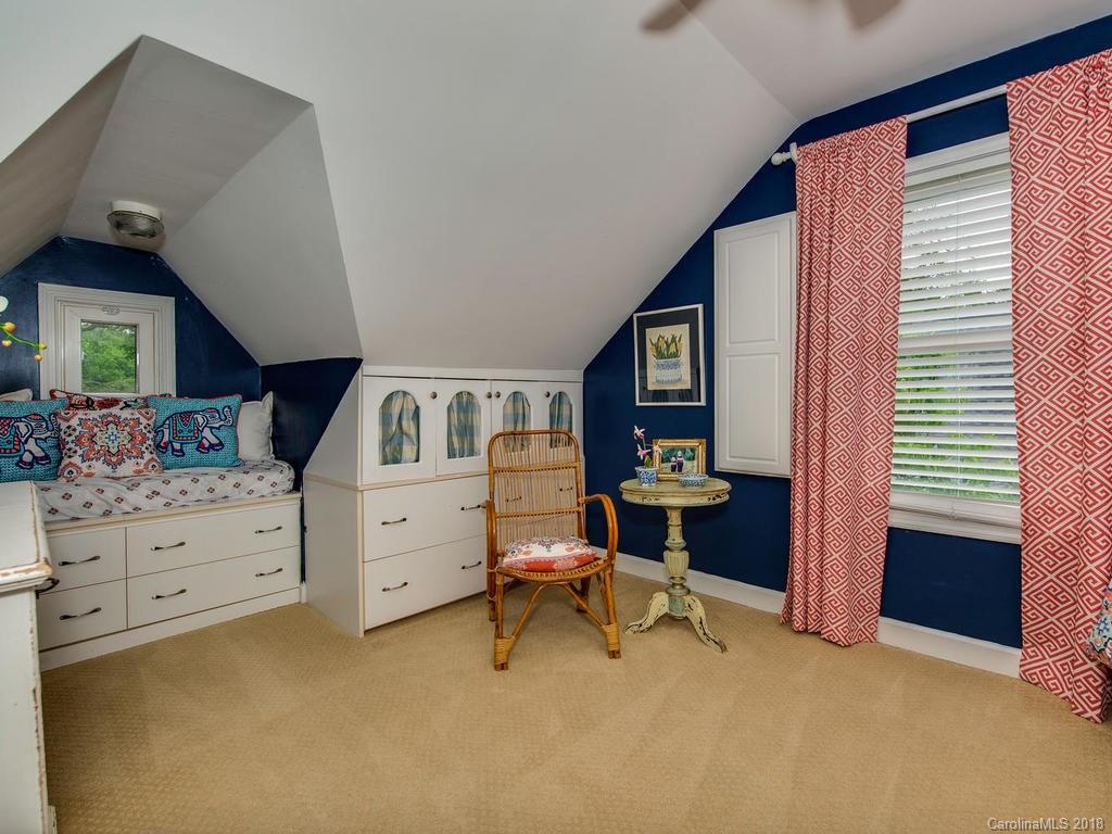 2174 Colony Road Charlotte, NC 28209 - Photo 20 of 24 a bed room with a bed and a window