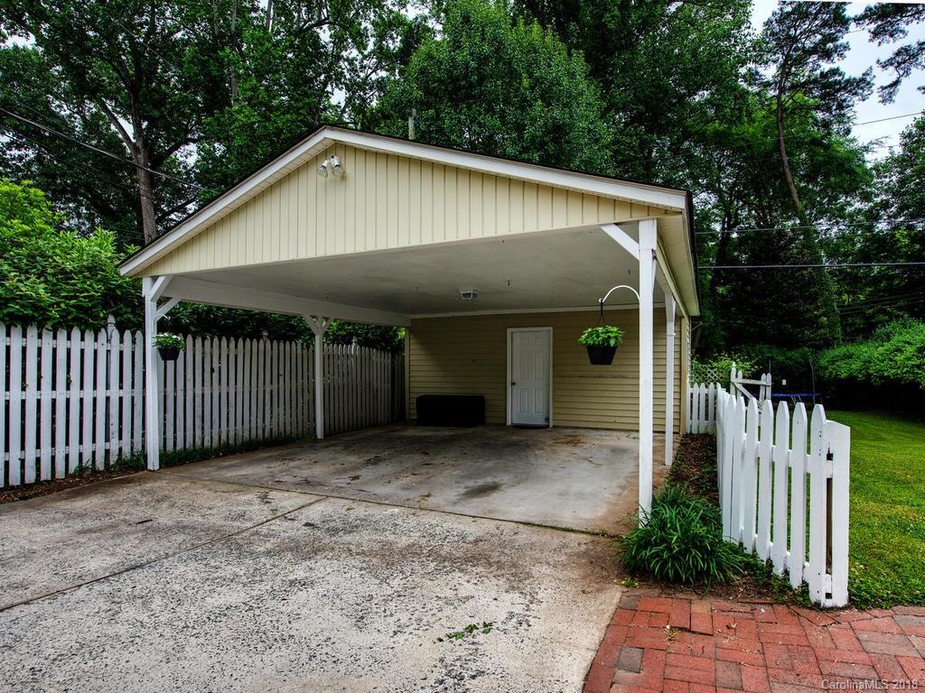 2174 Colony Road Charlotte, NC 28209 - Photo 24 of 24 a front view of a house with a porch