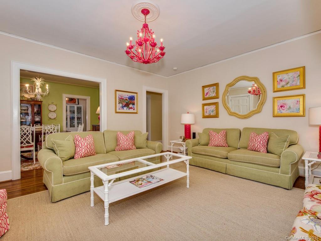 2174 Colony Road Charlotte, NC 28209 - Photo 6 of 24 a living room with furniture and a chandelier