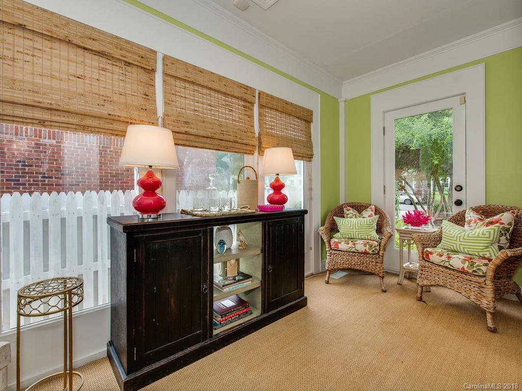 2174 Colony Road Charlotte, NC 28209 - Photo 7 of 24 a living room with furniture and a fireplace