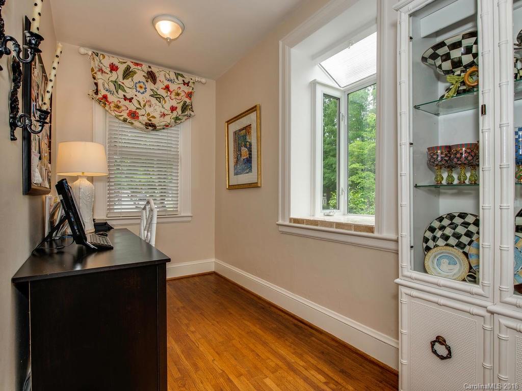 2174 Colony Road Charlotte, NC 28209 - Photo 9 of 24 a view of a workspace with furniture and a window