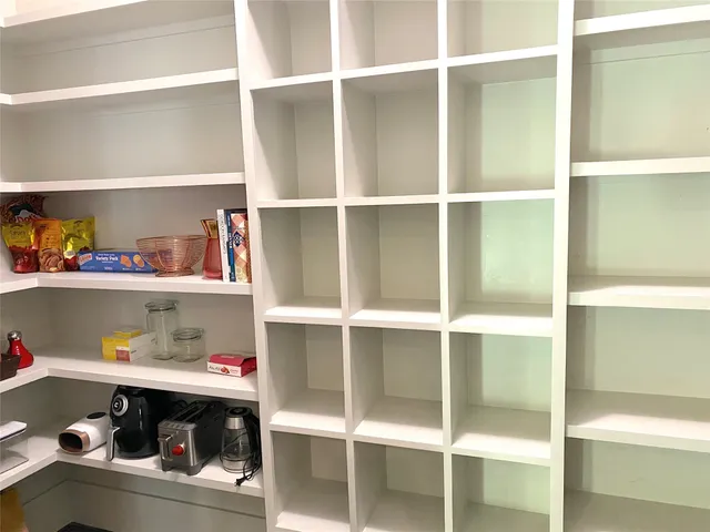 a room with a book shelf