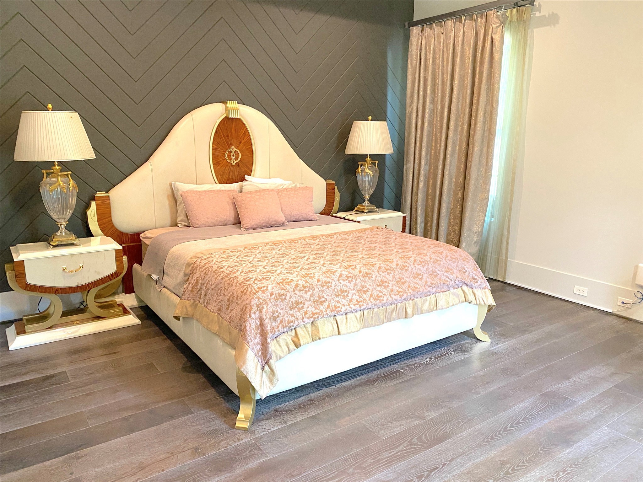 4642 Devon Street Houston, TX 77027 - Photo 16 of 39 a bedroom with a bed and a large window