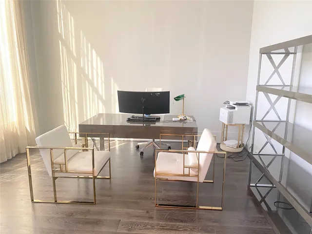 a workspace with table and chairs