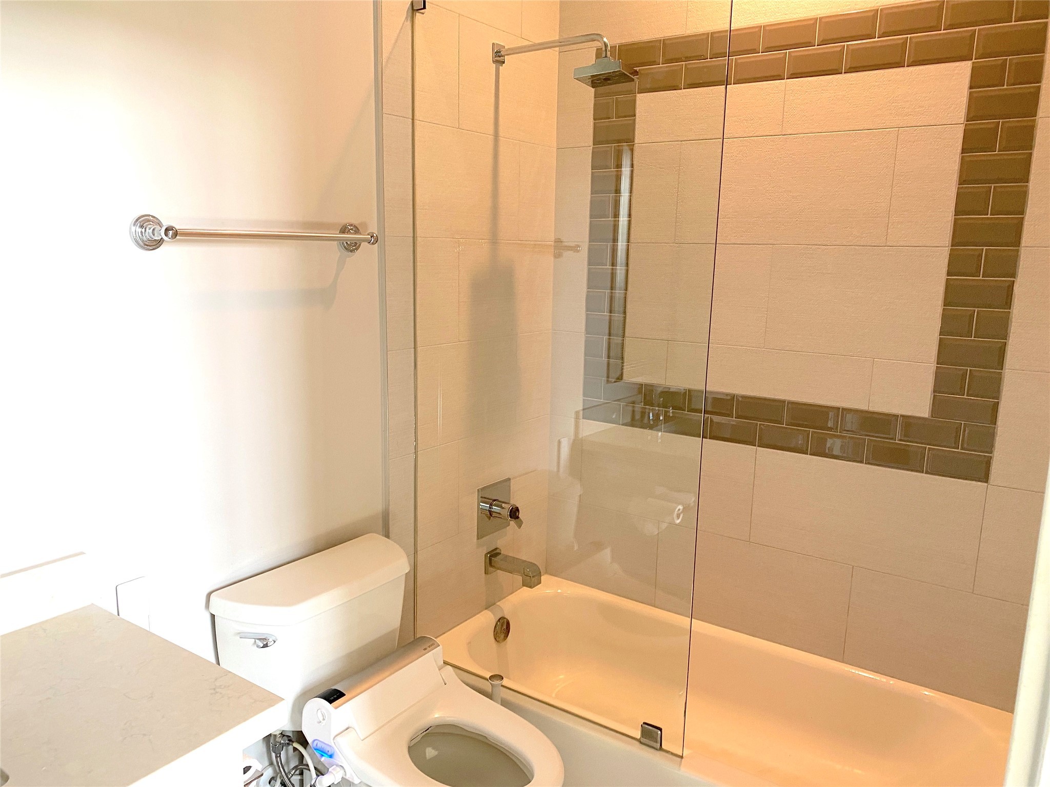 4642 Devon Street Houston, TX 77027 - Photo 31 of 39 a bathroom with a sink and a shower