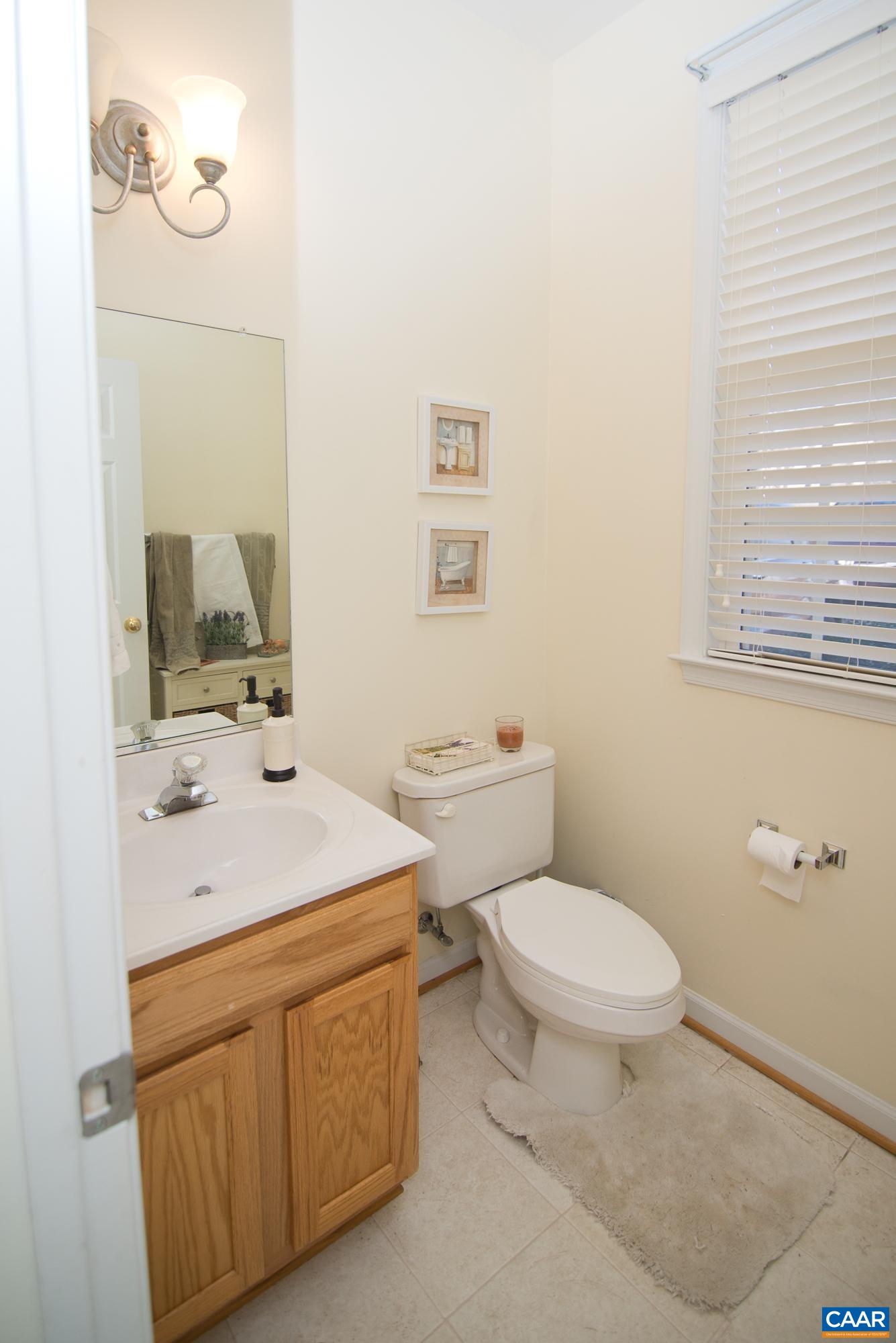 2986 Magnolia Bend Charlottesville, VA 22911 - Photo 13 of 22 a bathroom with a sink toilet vanity and mirror