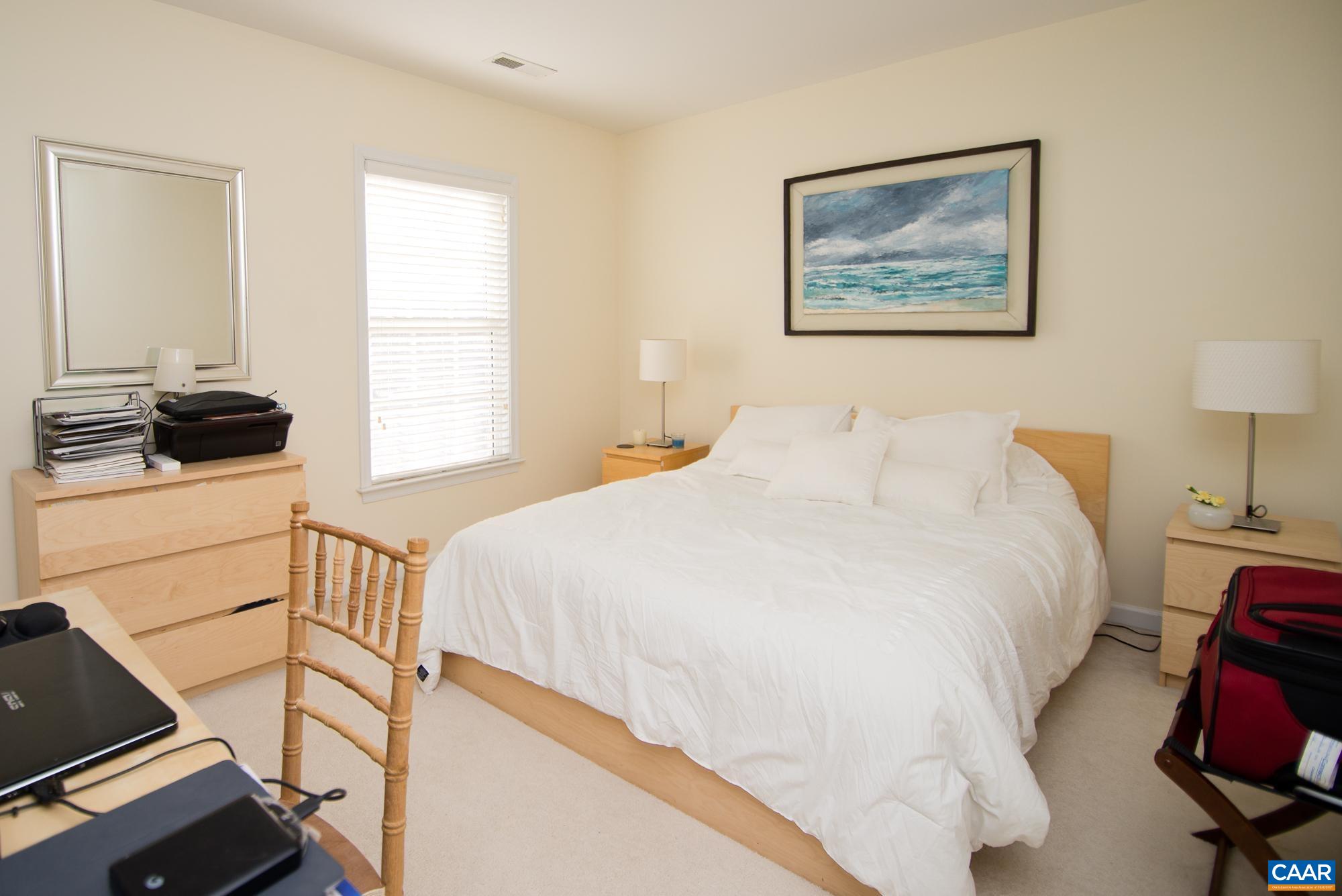 2986 Magnolia Bend Charlottesville, VA 22911 - Photo 18 of 22 a bedroom with a bed and a window