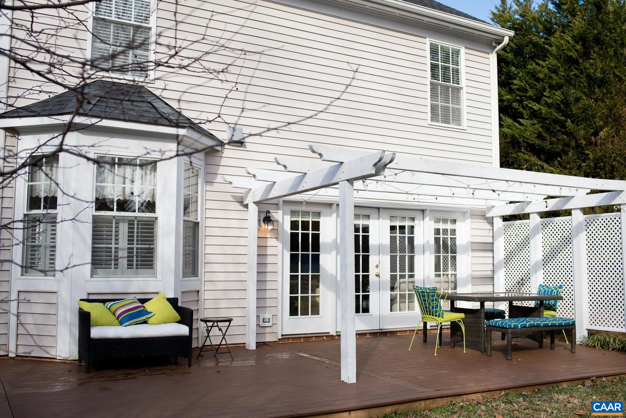 2986 Magnolia Bend Charlottesville, VA 22911 - Photo 19 of 22 a front view of a building with outdoor seating