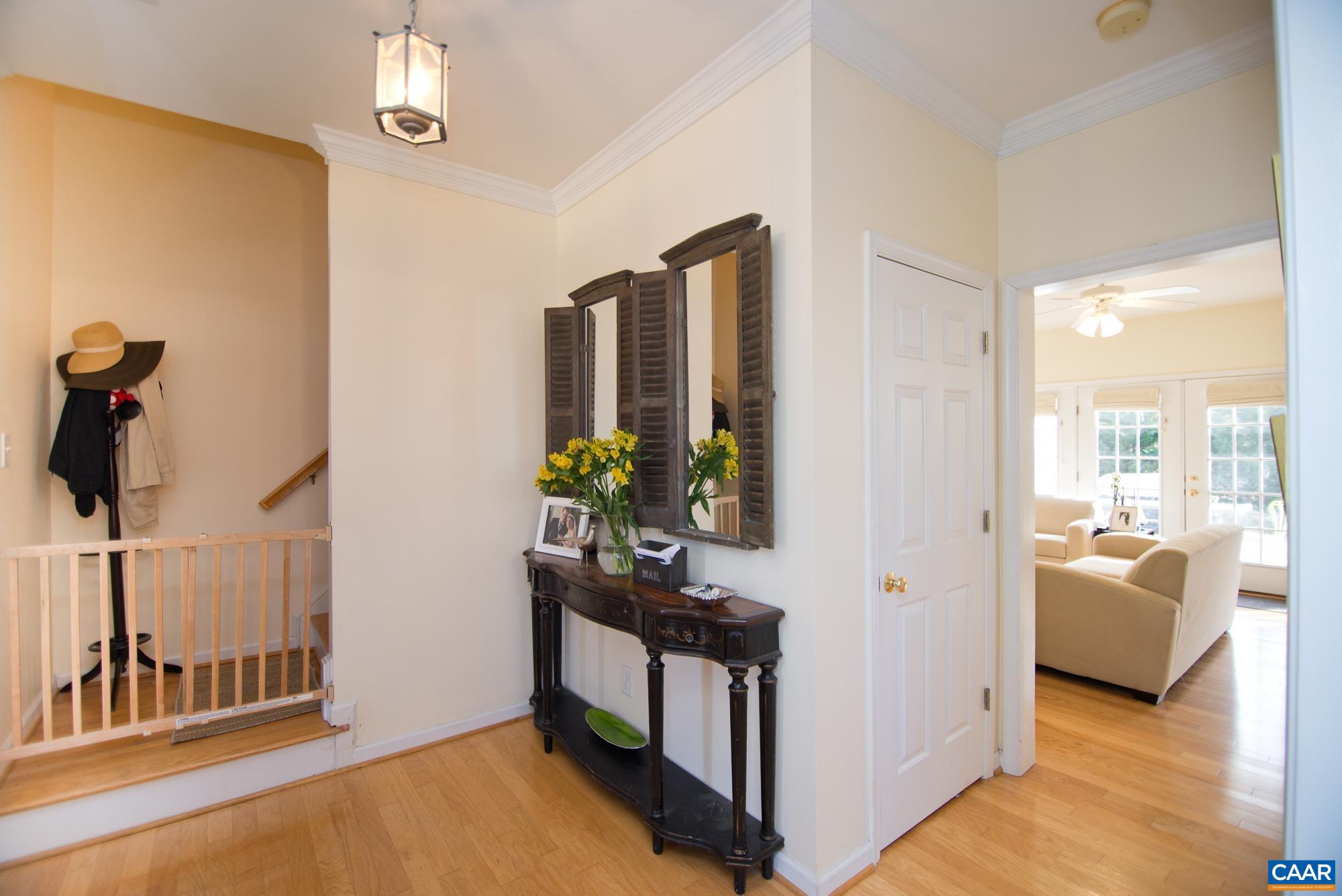 2986 Magnolia Bend Charlottesville, VA 22911 - Photo 2 of 22 a view of living room filled with furniture and a potted plant