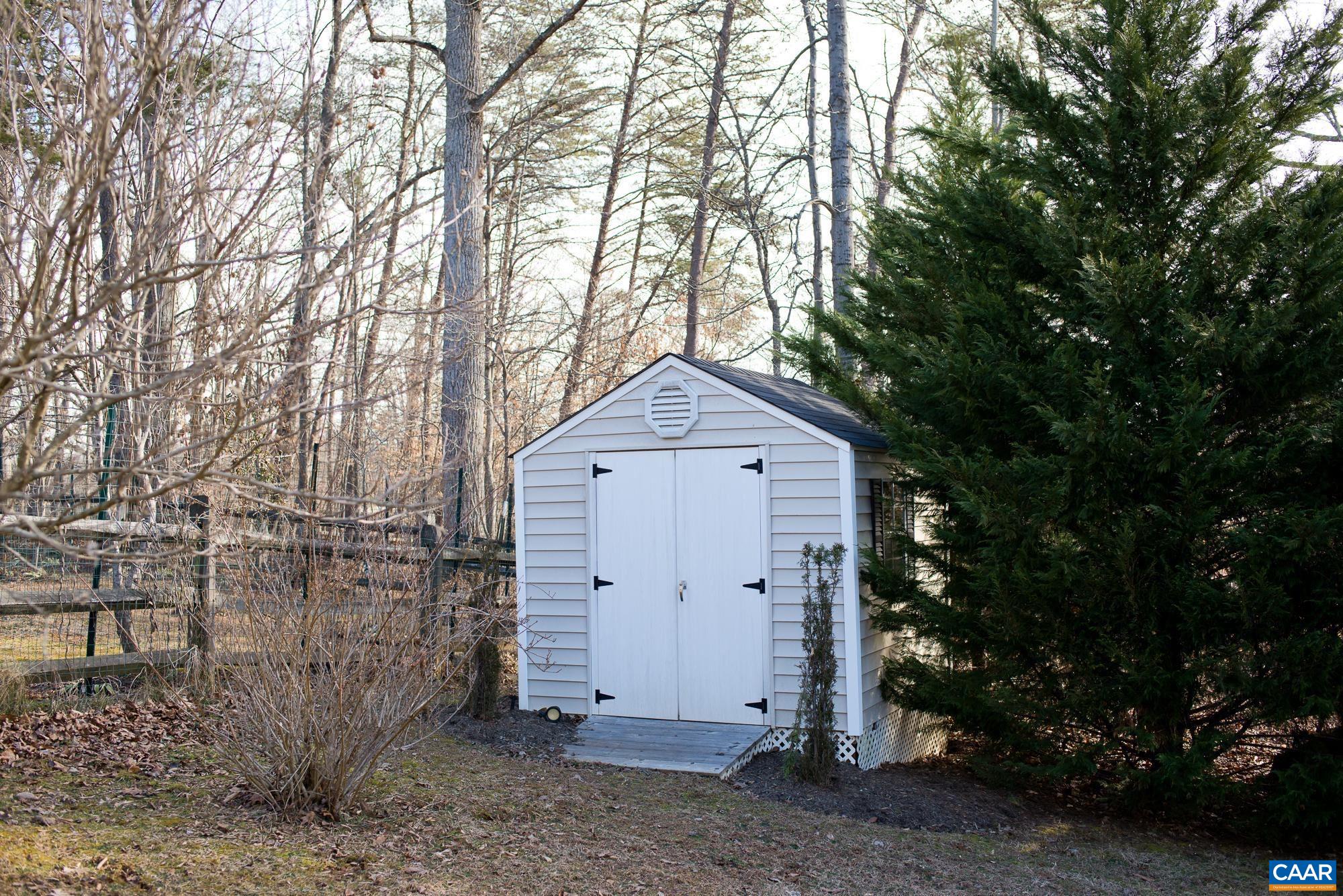 2986 Magnolia Bend Charlottesville, VA 22911 - Photo 22 of 22 a house with trees in front of it