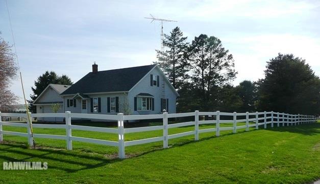 12982 North Bluff Road Baileyville, IL 61007 - Photo 2 of 25 a front view of a house with a yard