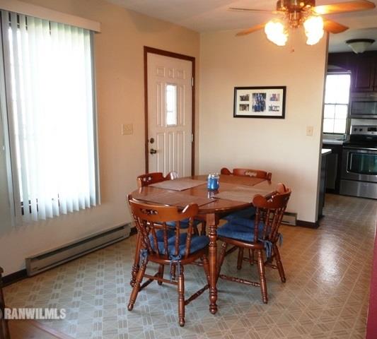 12982 North Bluff Road Baileyville, IL 61007 - Photo 5 of 25 a view of a dining room with furniture and window