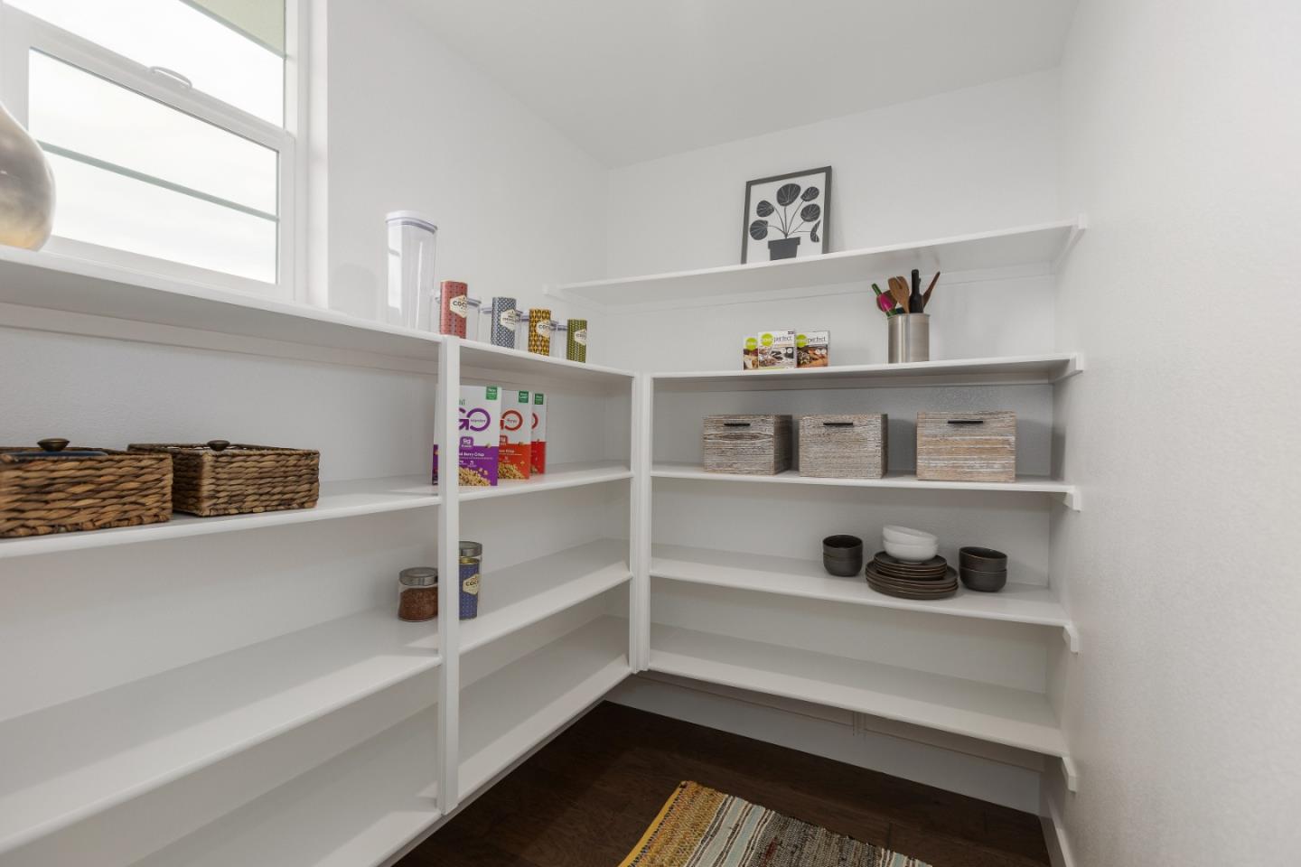 142 Cue Way Hayward, CA 94544 - Photo 12 of 24 a storage room with empty racks