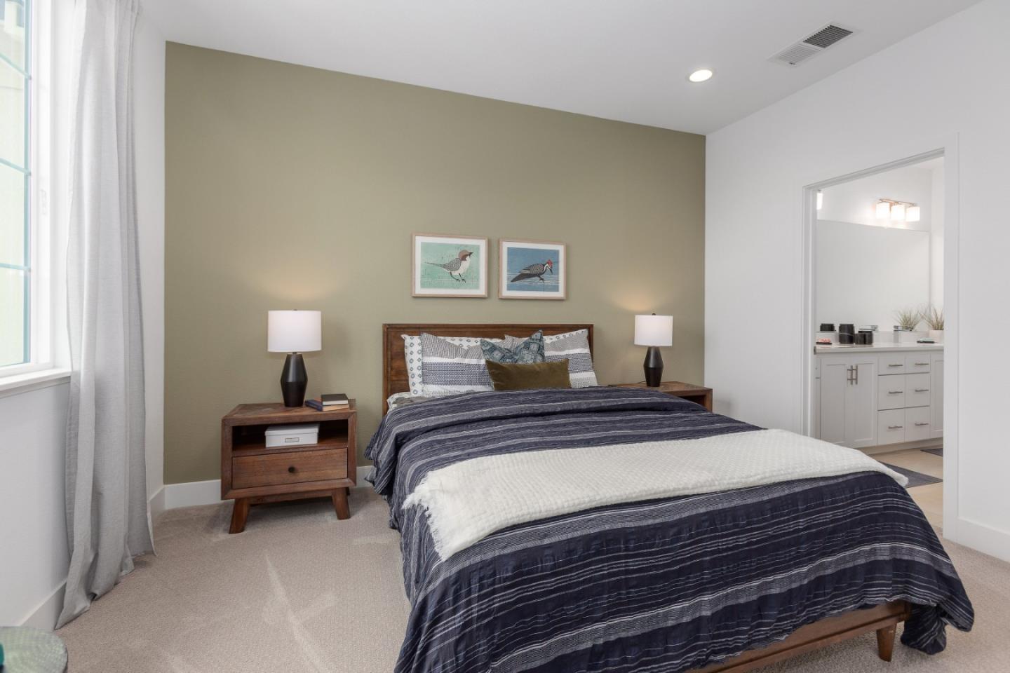 142 Cue Way Hayward, CA 94544 - Photo 22 of 24 a bedroom with a bed and a lamp