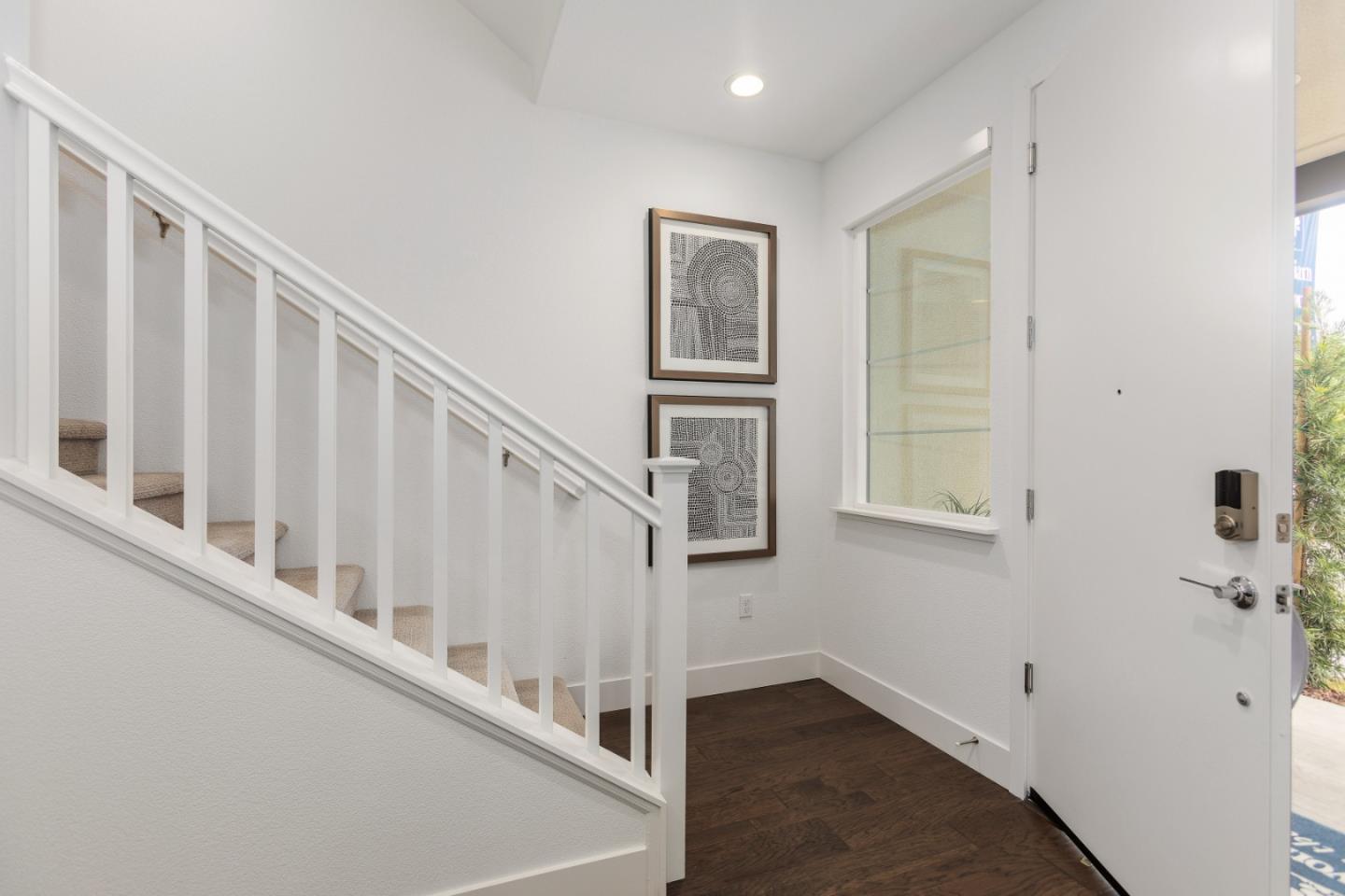 142 Cue Way Hayward, CA 94544 - Photo 7 of 24 a view of staircase with white walls and white walls