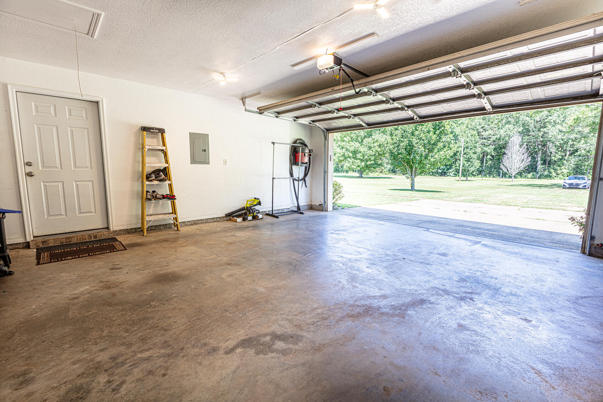 3602 Hazel Godwin Road Jay, FL 32565 - Photo 33 of 46 a view of a room with wooden floor and windows
