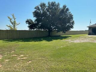 3602 Hazel Godwin Road Jay, FL 32565 - Photo 8 of 46 a view of a swimming pool with an outdoor space and seating area