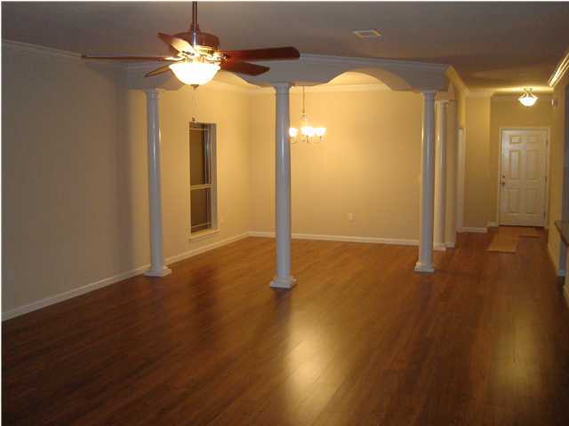 5252 Moore Loop Crestview, FL 32536 - Photo 6 of 28 a view of a livingroom with wooden floor