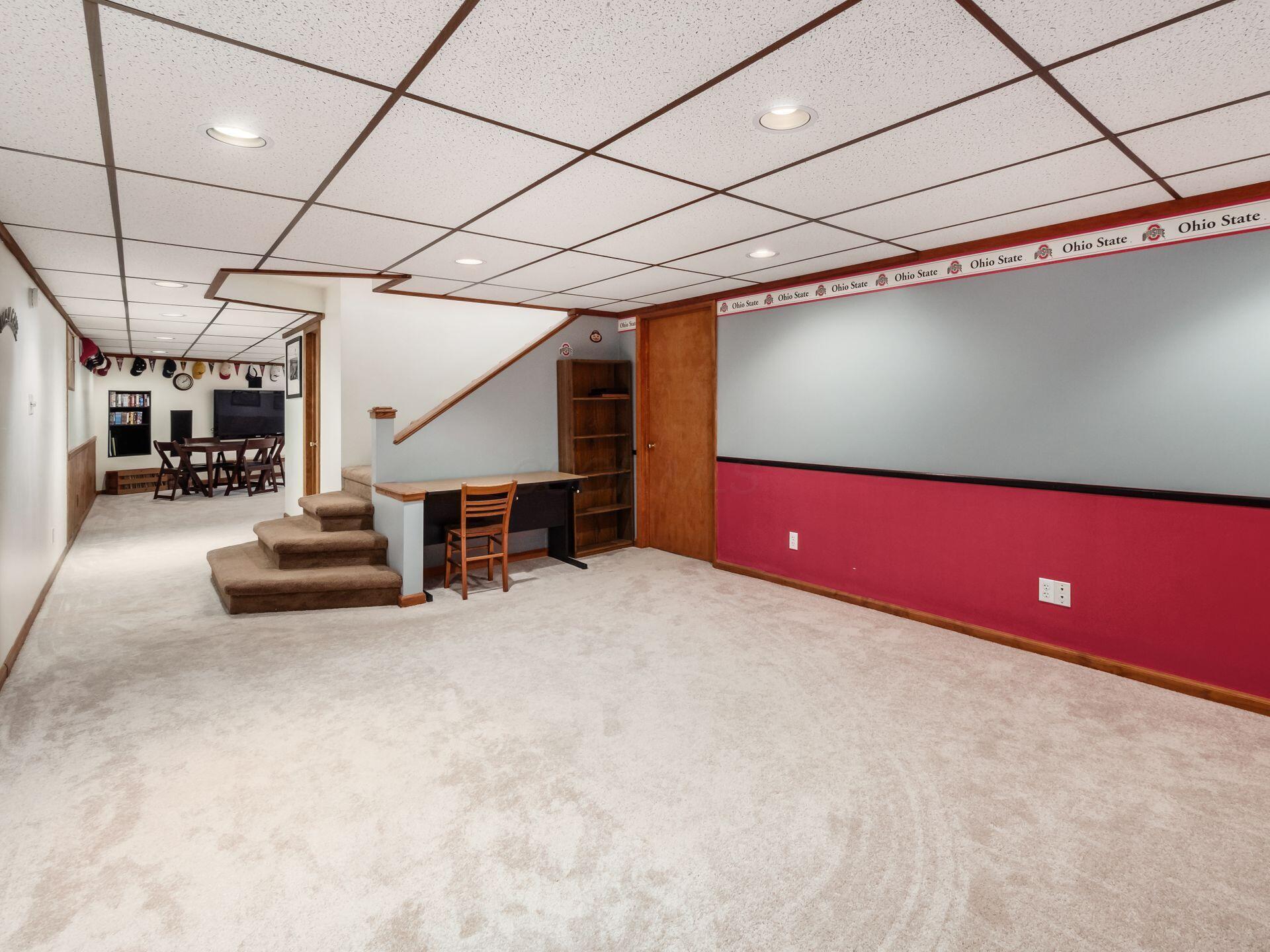 12741 Goodman Road Ashville, OH 43103 - Photo 32 of 61 The full finished basement has multiple large areas for entertainment