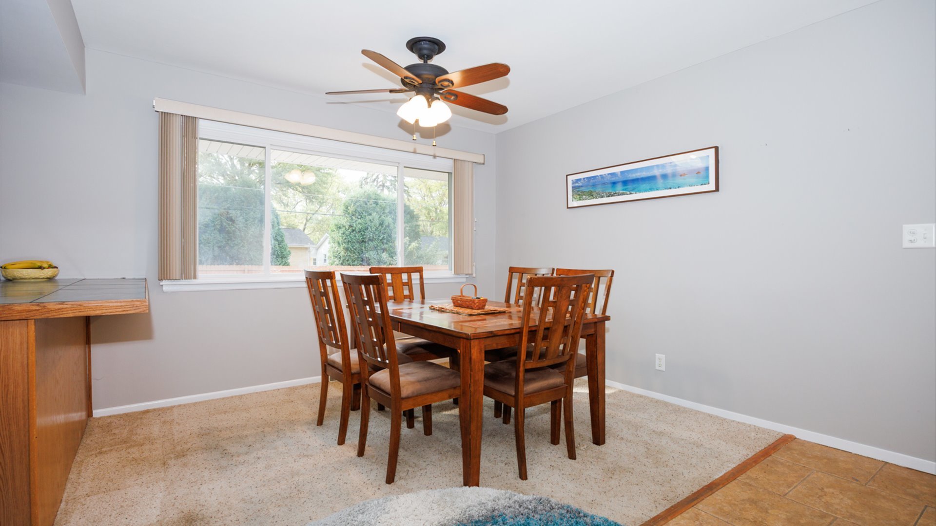 407 Tilden Place Normal, IL 61761 - Photo 16 of 49 a view of a dining room with furniture a rug and a large window