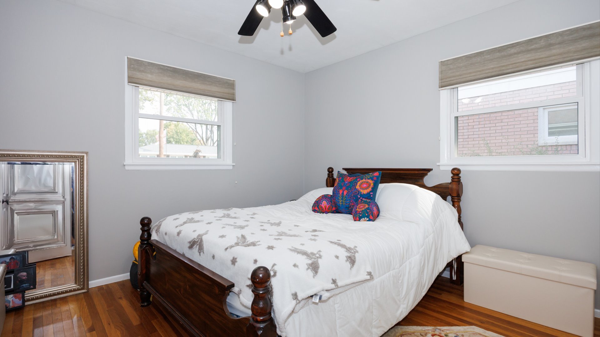 407 Tilden Place Normal, IL 61761 - Photo 18 of 49 a bedroom with a bed and wooden floor