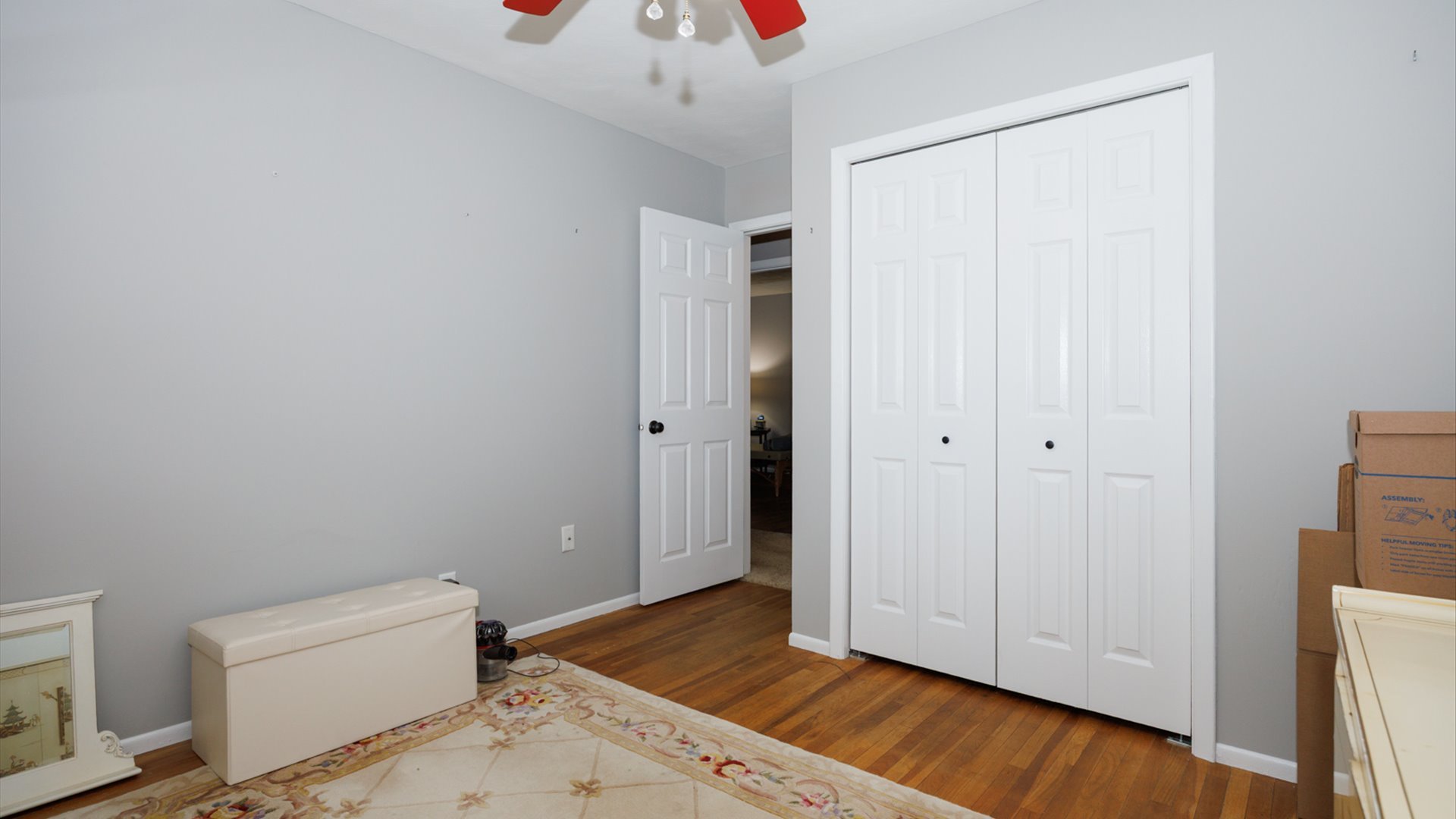407 Tilden Place Normal, IL 61761 - Photo 26 of 49 a view of livingroom with hardwood floor and white cabinet