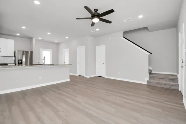 a terrace with outdoor seating and city view