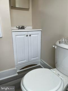 226 South Regester Street Baltimore, MD 21231 - Photo 14 of 17 a bathroom with a sink and toilet