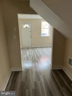 a view of an empty room and window