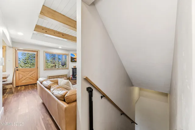 a living room with furniture and a couch