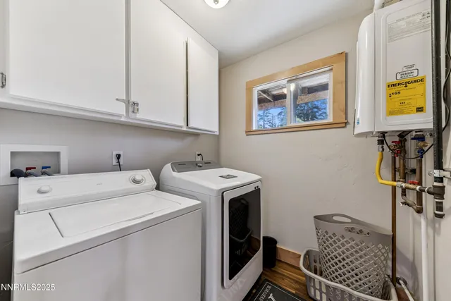 a view of storage and utility room with washer and dryer