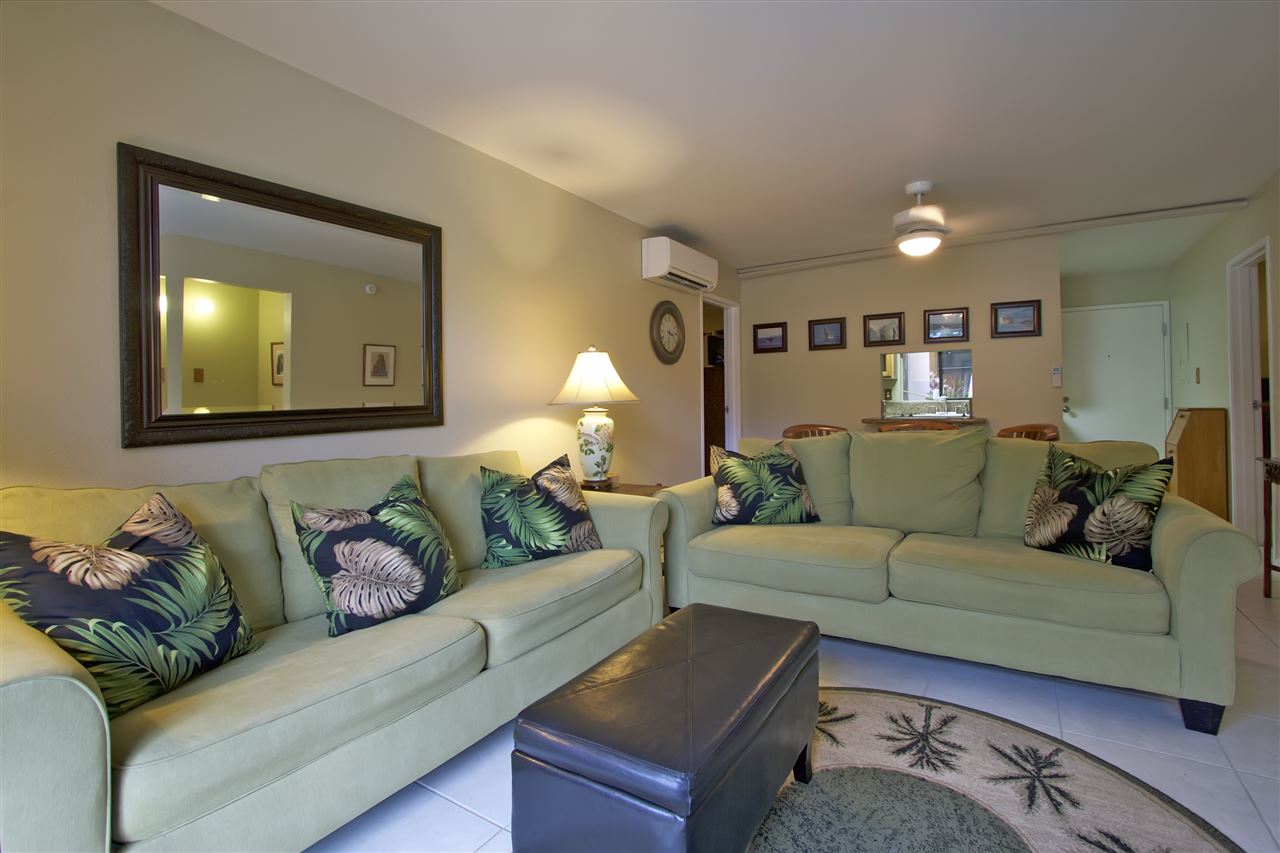 2219 South Kihei Road, Unit B102 Kihei, HI 96753 - Photo 18 of 30 a living room with furniture and a flat screen tv