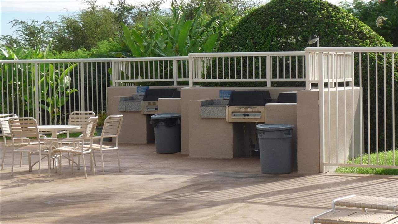 2219 South Kihei Road, Unit B102 Kihei, HI 96753 - Photo 23 of 30 a view of a chairs and table in the terrace