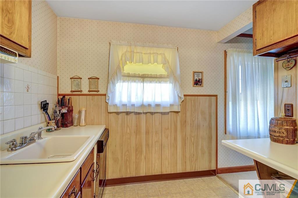 3 Columbia Road Old Bridge, NJ 08859 - Photo 8 of 20 a bathroom with a sink and a mirror