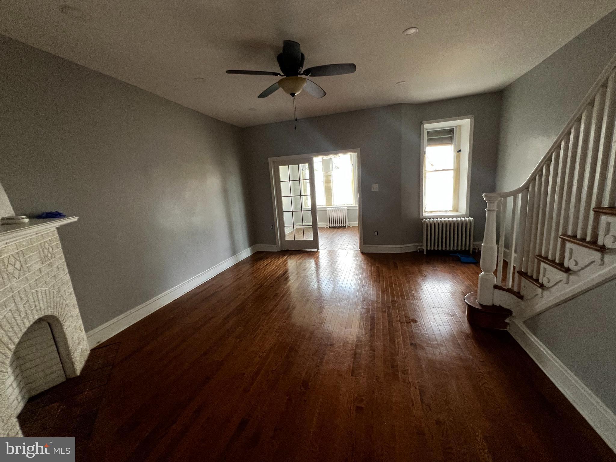 3340 Cottman Avenue Philadelphia, PA 19149 - Photo 18 of 42 a view of a livingroom with wooden floor and a ceiling fan