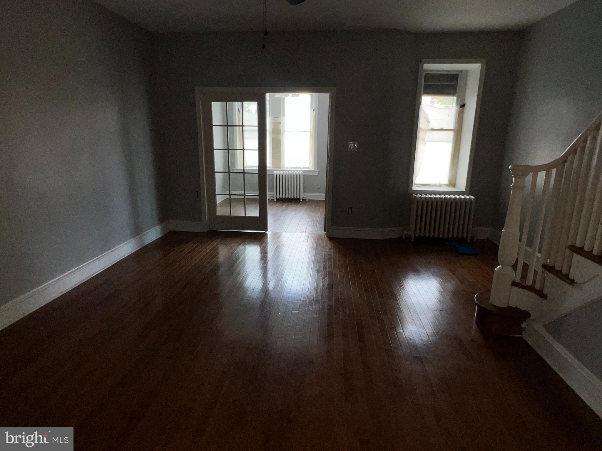 3340 Cottman Avenue Philadelphia, PA 19149 - Photo 26 of 42 a view of an empty room with wooden floor and a window