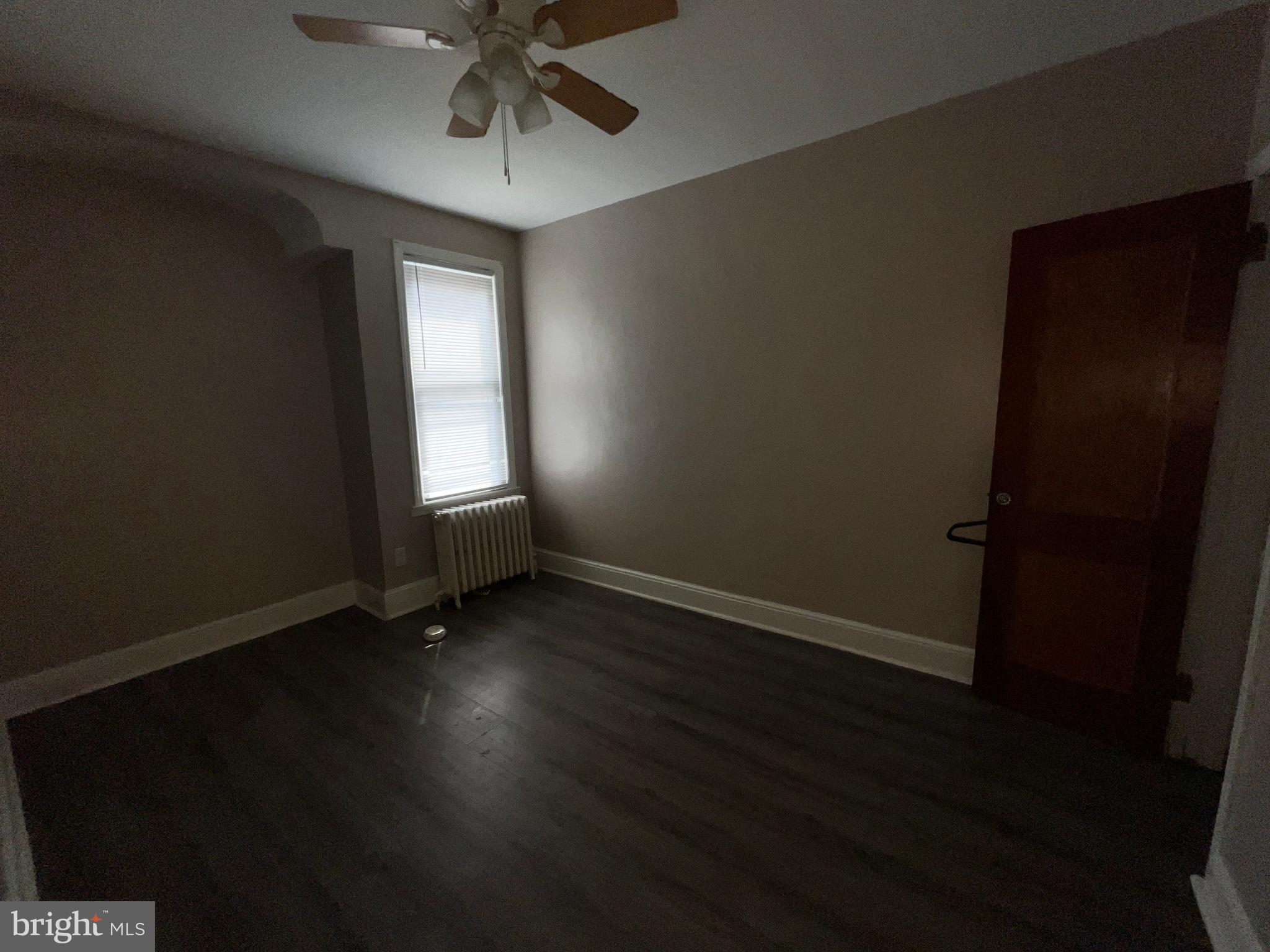 3340 Cottman Avenue Philadelphia, PA 19149 - Photo 33 of 42 a view of an empty room with wooden floor and a window