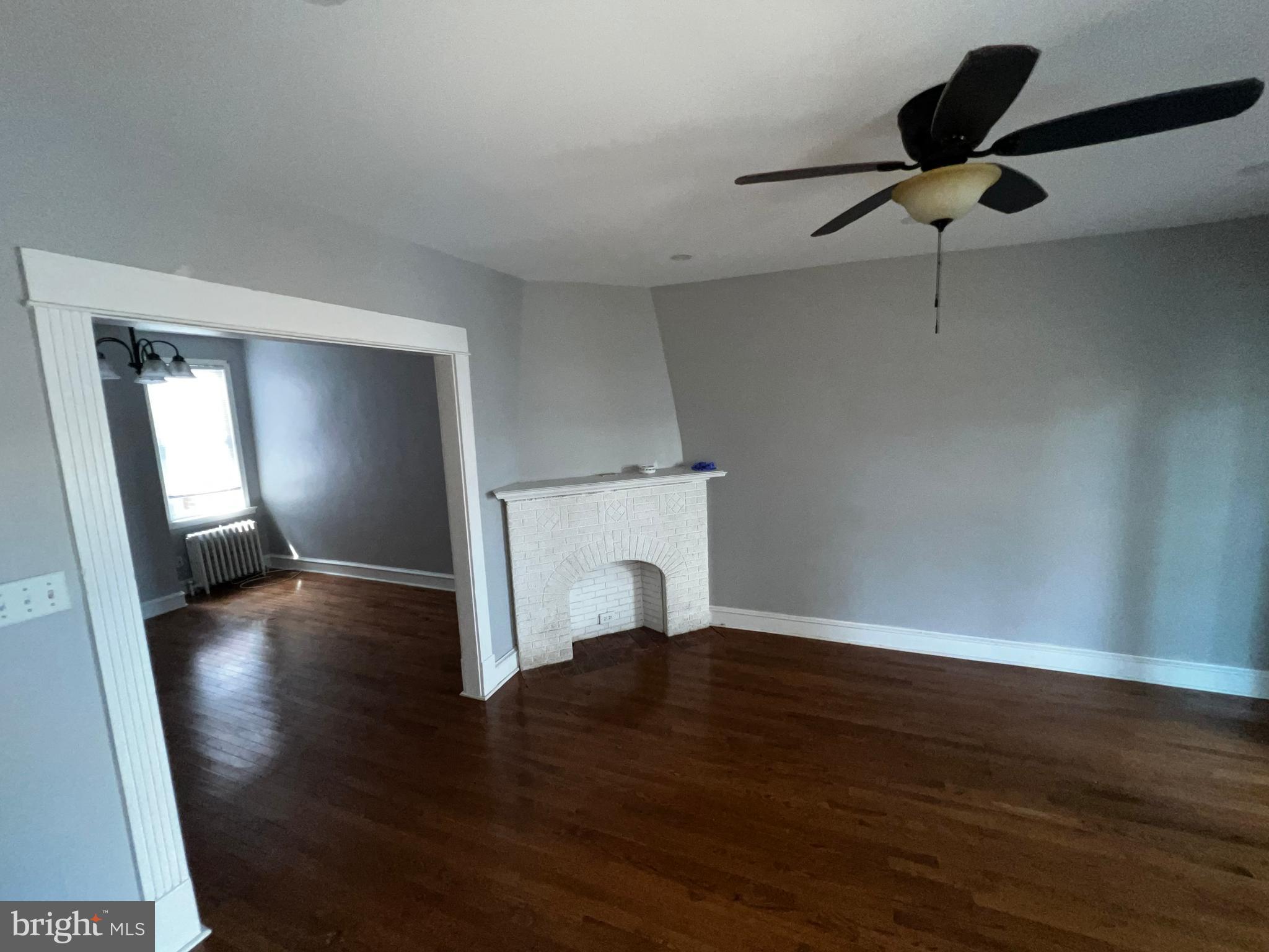3340 Cottman Avenue Philadelphia, PA 19149 - Photo 40 of 42 a view of an empty room with wooden floor and a window