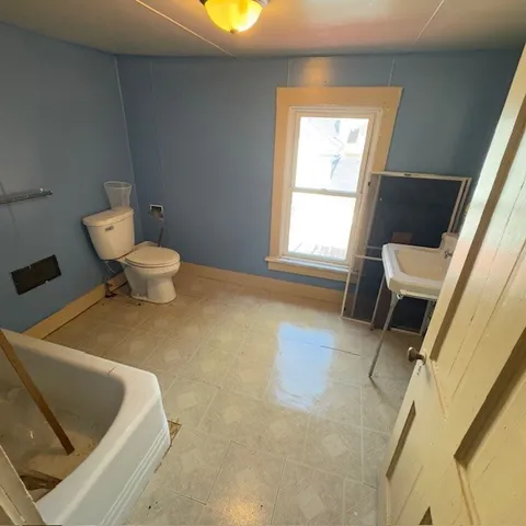 a spacious bathroom with a sink and a vanity