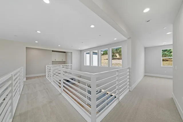 a kitchen with white cabinets